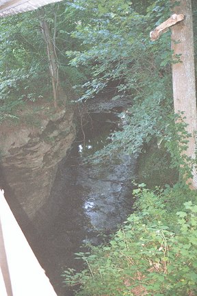 Standing on the bridge, looking down; Rock Mill Bridge, Fairfield County, Ohio.  Photo ca 2001 by D. Beckham